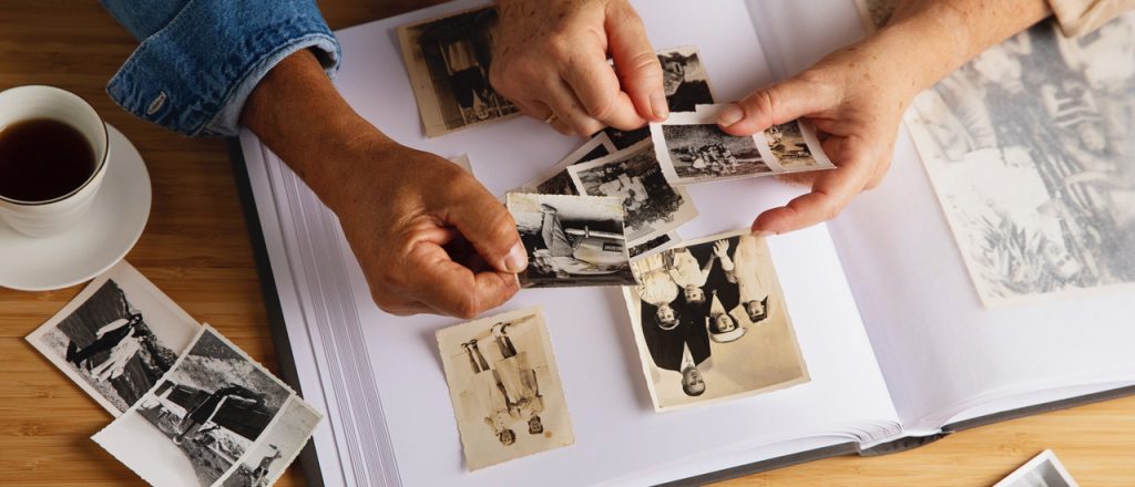 people looking picture album 1024x440